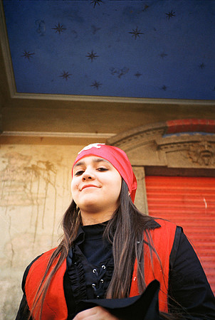 portrait of 13 year old girl dressed as a pirate for the carniva