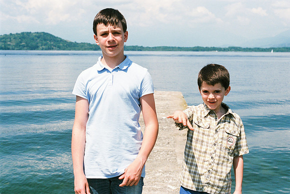 portrait of brothers children by the lake