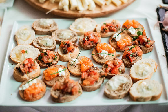 Variety of delicious appetizers displayed on a platter for a soc